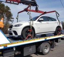 Фот опогрузки авто на платформу эвакуатора