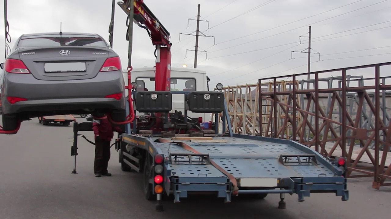 Фото эвакуатора с гидроманипулятором